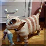 D18. Painted fabric cat.